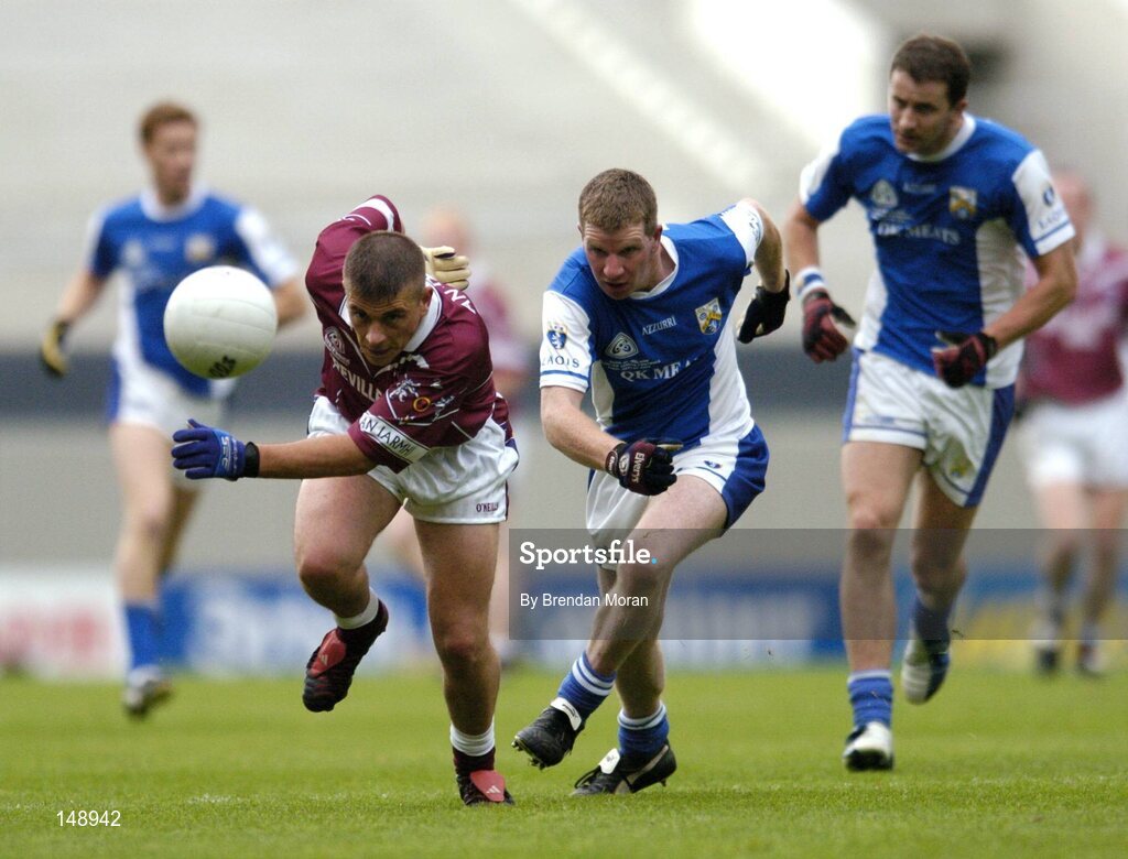 24 July 2004; Alan Mangan, Westmeath, in action against Paul McDonald, Laois. Bank of Ireland Leinster Senior Football Championship Final Replay, Westmeath v Laois, Croke Park, Dublin. Picture credit; Brendan Moran / SPORTSFILE