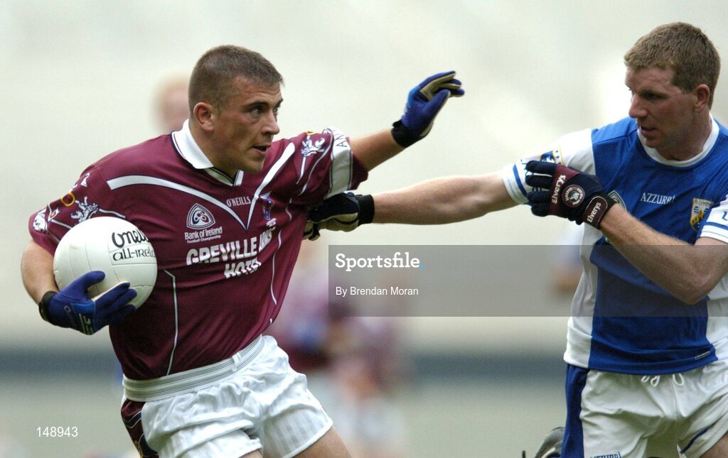 24 July 2004; Alan Mangan, Westmeath, in action against Paul McDonald, Laois. Bank of Ireland Leinster Senior Football Championship Final Replay, Westmeath v Laois, Croke Park, Dublin. Picture credit; Brendan Moran / SPORTSFILE