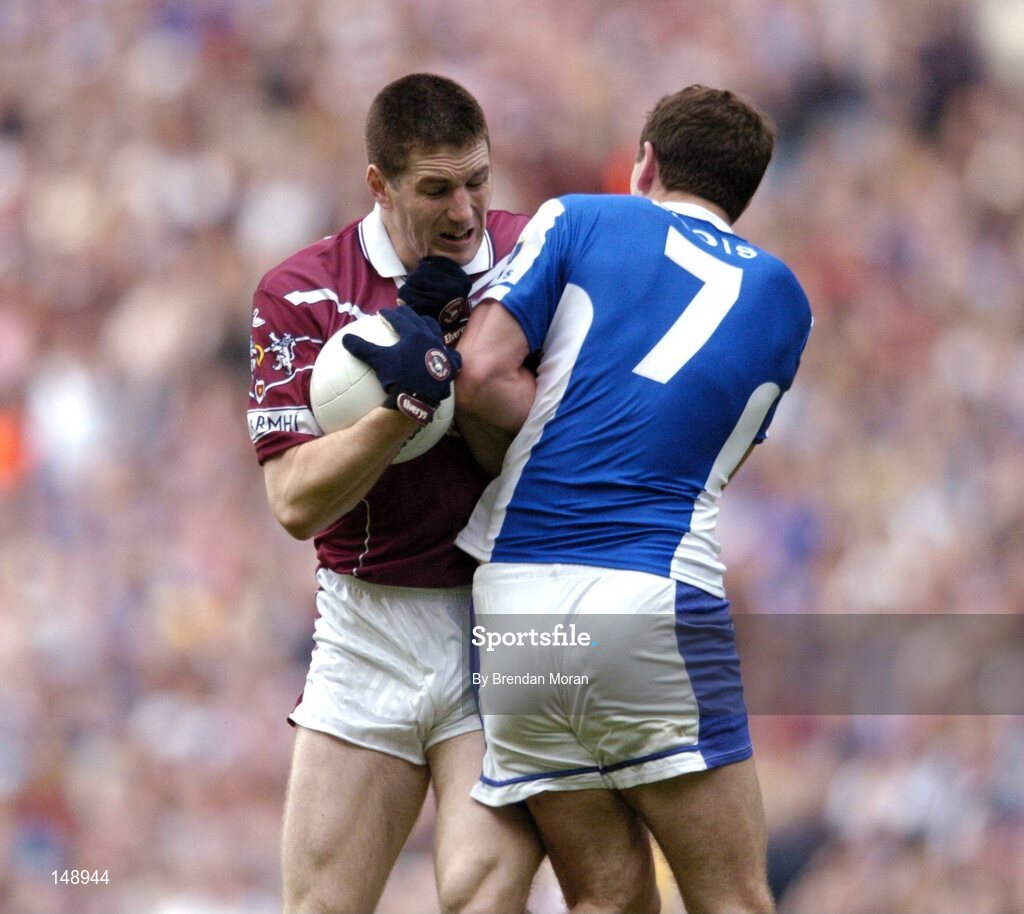 24 July 2004; David O'Shaughnessy, Westmeath, in action against Kevin Fitzpatrick, Laois. Bank of Ireland Leinster Senior Football Championship Final Replay, Westmeath v Laois, Croke Park, Dublin. Picture credit; Brendan Moran / SPORTSFILE