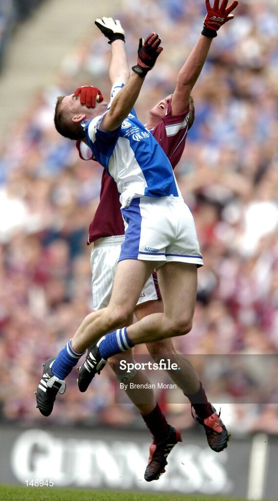 24 July 2004; Joe Higgins, Laois, in action against Denis Glennon, Westmeath. Bank of Ireland Leinster Senior Football Championship Final Replay, Westmeath v Laois, Croke Park, Dublin. Picture credit; Brendan Moran / SPORTSFILE