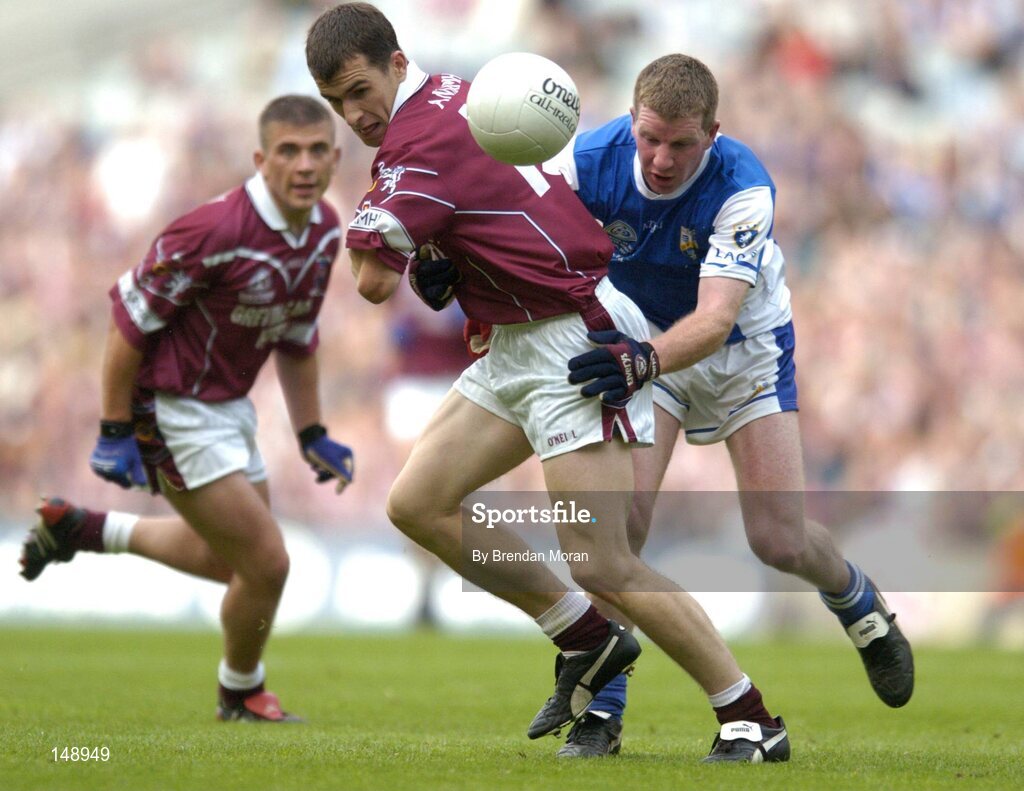 24 July 2004; Dessie Dolan, Westmeath, in action against Paul McDonald, Laois. Bank of Ireland Leinster Senior Football Championship Final Replay, Westmeath v Laois, Croke Park, Dublin. Picture credit; Brendan Moran / SPORTSFILE