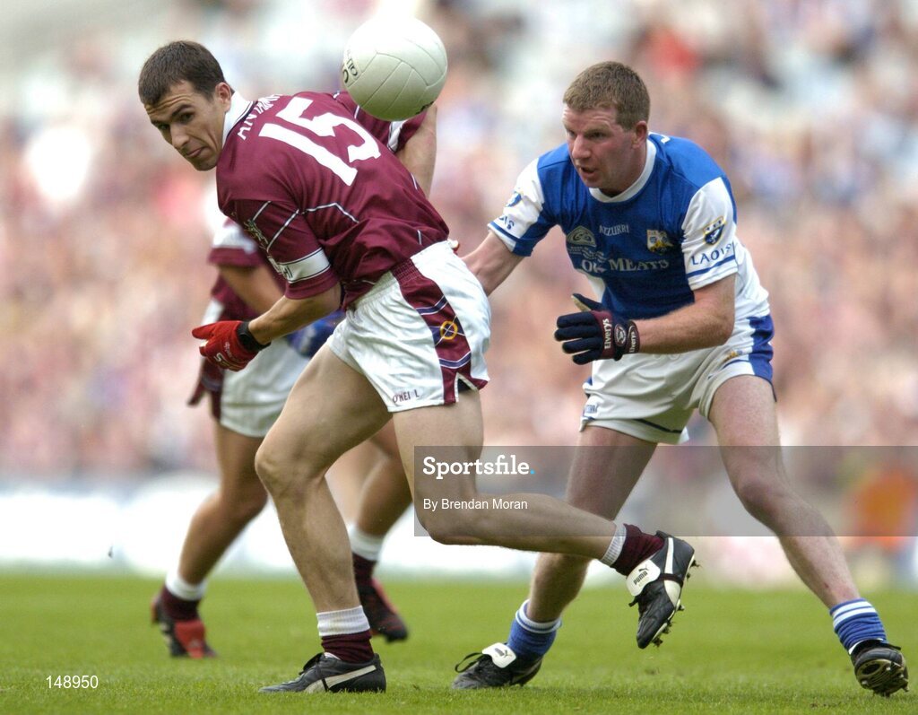 24 July 2004; Dessie Dolan, Westmeath, in action against Paul McDonald, Laois. Bank of Ireland Leinster Senior Football Championship Final Replay, Westmeath v Laois, Croke Park, Dublin. Picture credit; Brendan Moran / SPORTSFILE