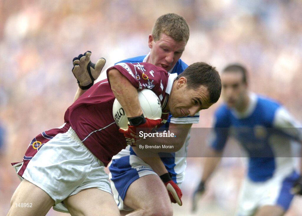 24 July 2004; Dessie Dolan, Westmeath, in action against Paul McDonald, Laois. Bank of Ireland Leinster Senior Football Championship Final Replay, Westmeath v Laois, Croke Park, Dublin. Picture credit; Brendan Moran / SPORTSFILE
