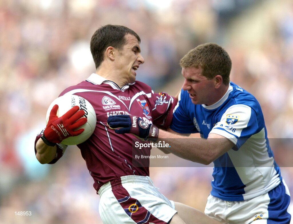 24 July 2004; Dessie Dolan, Westmeath, in action against Paul McDonald, Laois. Bank of Ireland Leinster Senior Football Championship Final Replay, Westmeath v Laois, Croke Park, Dublin. Picture credit; Brendan Moran / SPORTSFILE