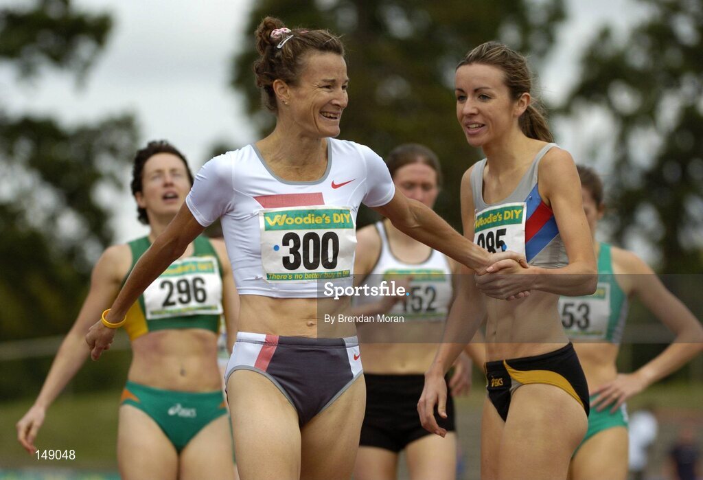 25 July 2004; Winner Aoife Byrne, right, Dundrum South Dublin AC, is congratulated by third placed Sonia O'Sullivan, Ballymore Cobh, fater her victory in the Women's 800m Final. AAI Senior Track and Field Championships, Morton Stadium, Santry, Dublin. Picture credit; Brendan Moran / SPORTSFILE