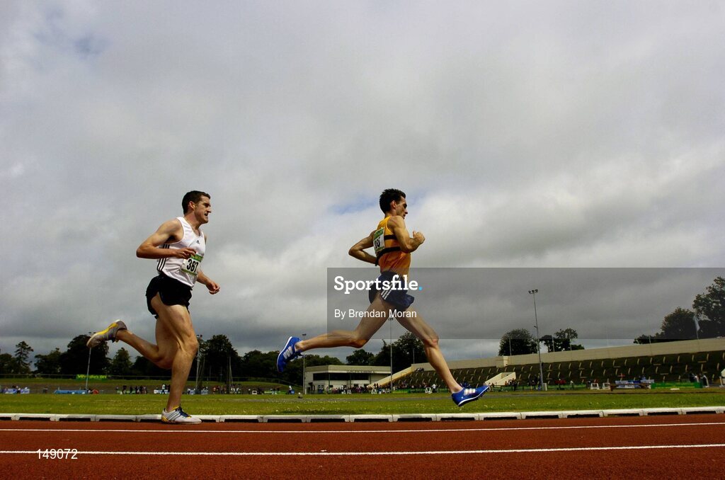25 July 2004; Mark Carroll, Leevale AC, leads Gareth Turnbull, St Malachy's AC, during the Men's 5000m Final. AAI Senior Track and Field Championships, Morton Stadium, Santry, Dublin. Picture credit; Brendan Moran / SPORTSFILE