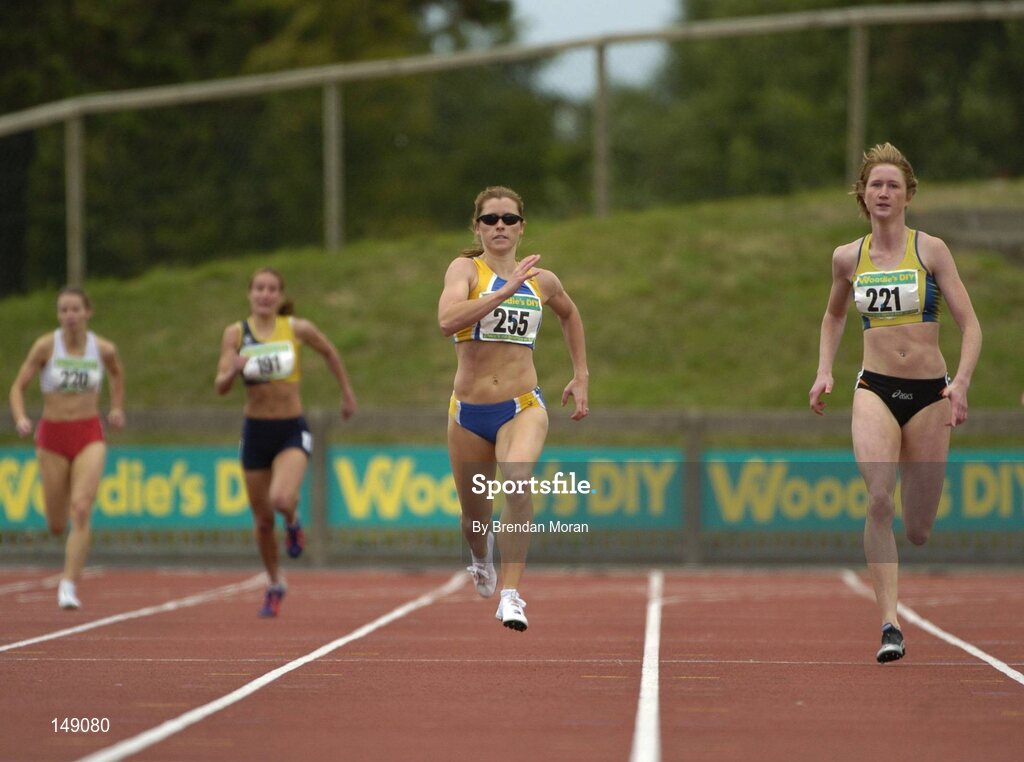 25 July 2004; Karen Shinkins (255), Dundrum South Dublin AC, leads Joanne Cuddihy (221), Kilkenny City Harriers, on her way to victory in the Women's 400m Final. AAI Senior Track and Field Championships, Morton Stadium, Santry, Dublin. Picture credit; Brendan Moran / SPORTSFILE