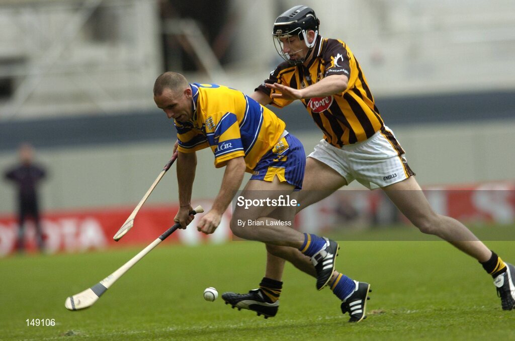 25 July 2004; Colin Lynch, Clare, in action against Derek Lyng, Kilkenny. Guinness All-Ireland Senior Hurling Championship, Quarter Final, Clare v Kilkenny, Croke Park, Dublin. Picture credit; Brian Lawless / SPORTSFILE