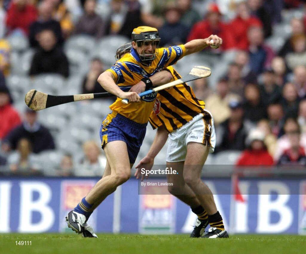 25 July 2004; Tony Griffin, Clare, in action against J.J. Delaney, Kilkenny. Guinness All-Ireland Senior Hurling Championship, Quarter Final, Clare v Kilkkenny, Croke Park, Dublin. Picture credit; Brian Lawless / SPORTSFILE
