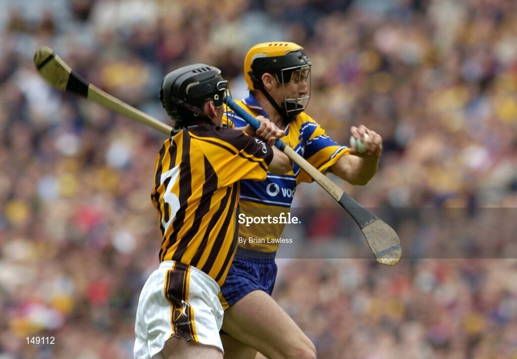 25 July 2004; Tony Griffin, Clare, in action against Noel Hickey, Kilkenny. Guinness All-Ireland Senior Hurling Championship, Quarter Final, Clare v Kilkenny, Croke Park, Dublin. Picture credit; Brian Lawless / SPORTSFILE