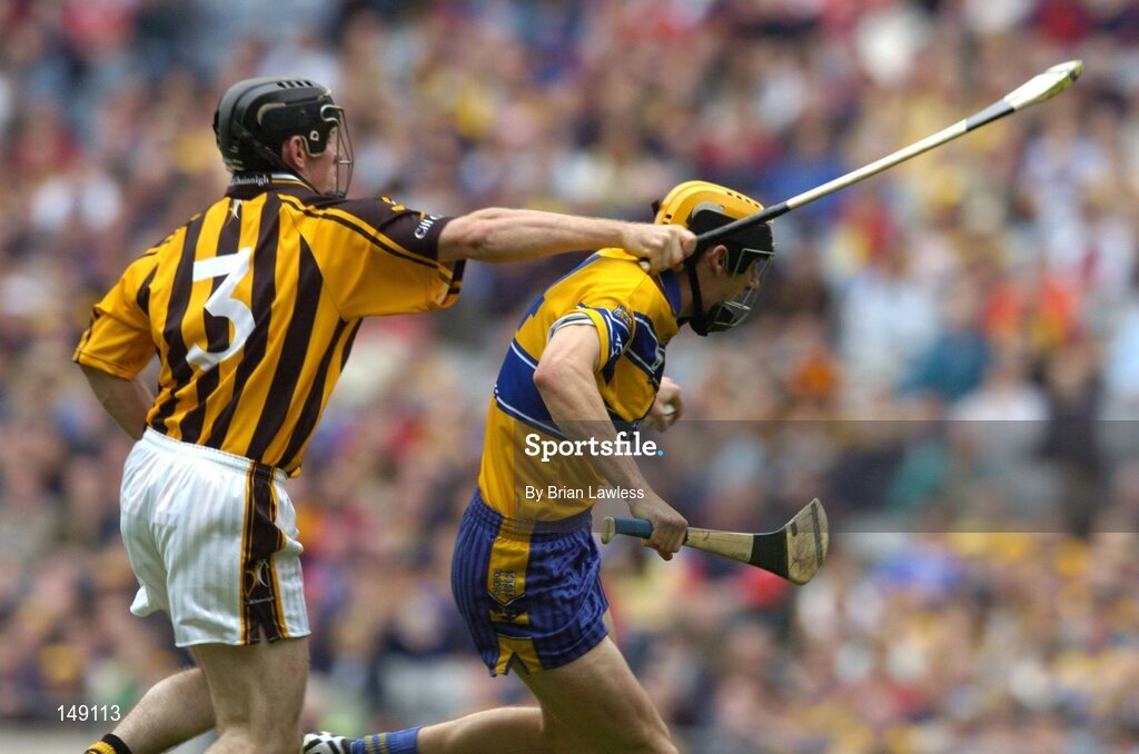 25 July 2004; Tony Griffin, Clare, in action against Noel Hickey, Kilkenny. Guinness All-Ireland Senior Hurling Championship, Quarter Final, Clare v Kilkkenny, Croke Park, Dublin. Picture credit; Brian Lawless / SPORTSFILE