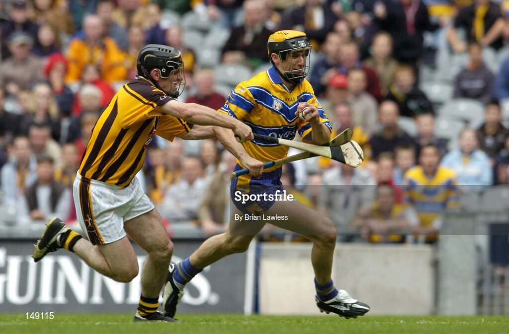 25 July 2004; Tony Griffin, Clare, in action against Noel Hickey, Kilkenny. Guinness All-Ireland Senior Hurling Championship, Quarter Final, Clare v Kilkkenny, Croke Park, Dublin. Picture credit; Brian Lawless / SPORTSFILE