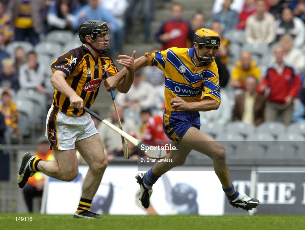 25 July 2004; Tony Griffin, Clare, in action against Noel Hickey, Kilkenny. Guinness All-Ireland Senior Hurling Championship, Quarter Final, Clare v Kilkenny, Croke Park, Dublin. Picture credit; Brian Lawless / SPORTSFILE