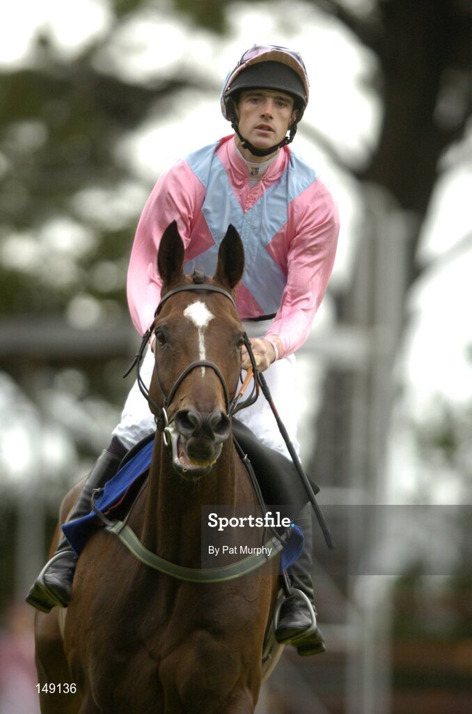 28 July 2004; One Night Out, with Ruby Walsh up, canters to the start for the HP Galway Plate. Galway Races, Ballybrit, Co. Galway. Picture credit; Pat Murphy / SPORTSFILE