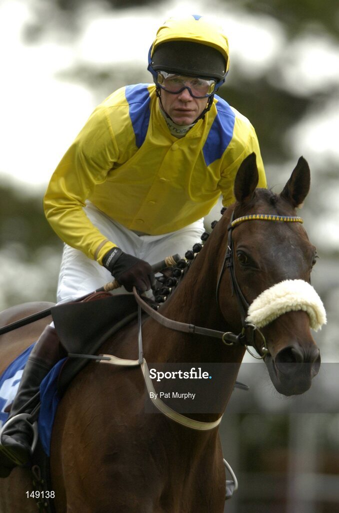 28 July 2004; Direct Bearing, with Mick Fitzgerald up, canters to the start for the HP Galway Plate. Galway Races, Ballybrit, Co. Galway. Picture credit; Pat Murphy / SPORTSFILE