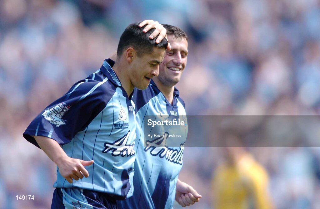 1 August 2004; Dublin's Jason Sherlock, left, is congratulated by team-mate Alan Brogan after scoring a goal for his side. Bank of Ireland All-Ireland Football Championship, Round 4, Dublin v Roscommon, Croke Park, Dublin. Picture credit; Brian Lawless / SPORTSFILE