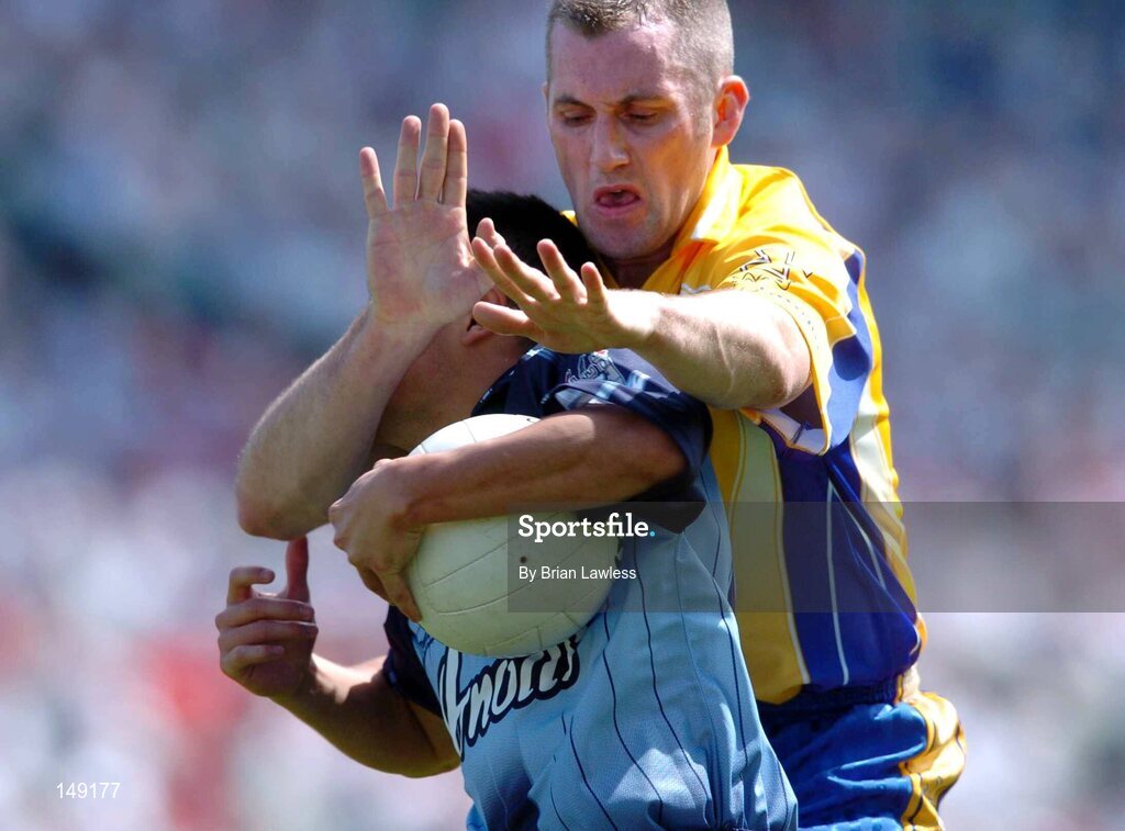 1 August 2004; Jason Sherlock, Dublin, in action against Ray Cox, Roscommon. Bank of Ireland All-Ireland Football Championship, Round 4, Dublin v Roscommon, Croke Park, Dublin. Picture credit; Brian Lawless / SPORTSFILE