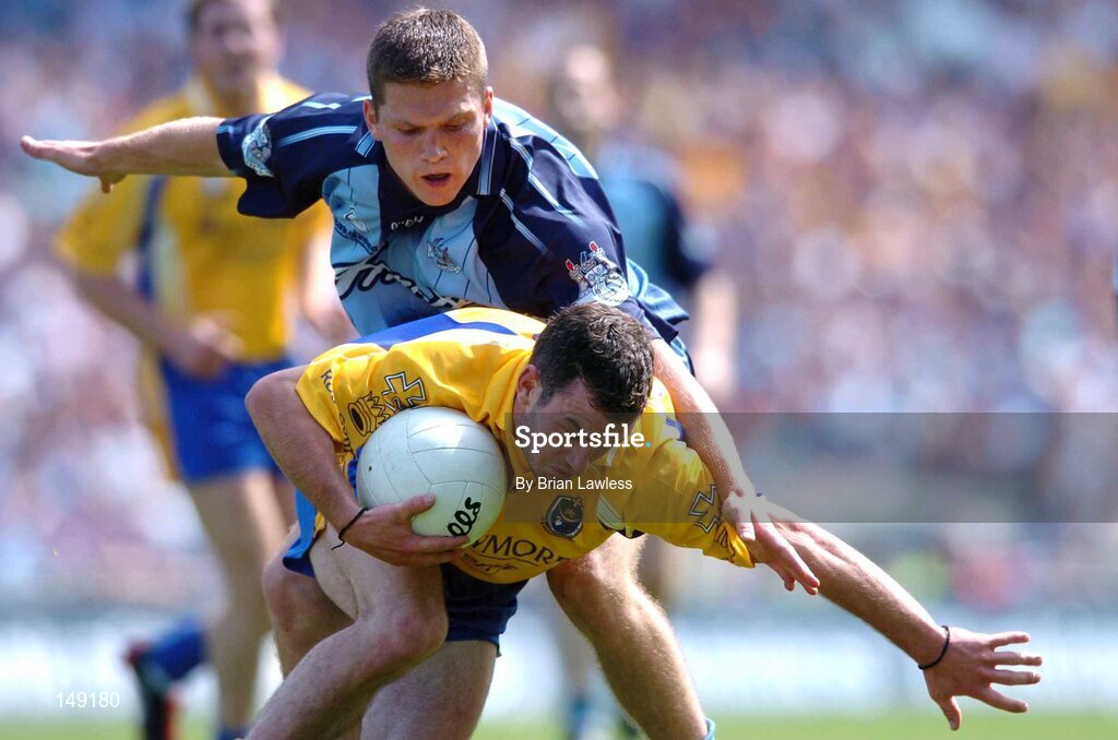 1 August 2004; Eamon Towey, Roscommon, in action against Conal Keaney, Dublin. Bank of Ireland All-Ireland Football Championship, Round 4, Dublin v Roscommon, Croke Park, Dublin. Picture credit; Brian Lawless / SPORTSFILE