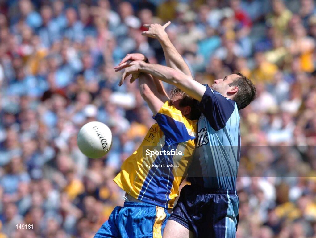 1 August 2004; Michael Ryan, Roscommon, in action against Ian Robertson, Dublin. Bank of Ireland All-Ireland Football Championship, Round 4, Dublin v Roscommon, Croke Park, Dublin. Picture credit; Brian Lawless / SPORTSFILE