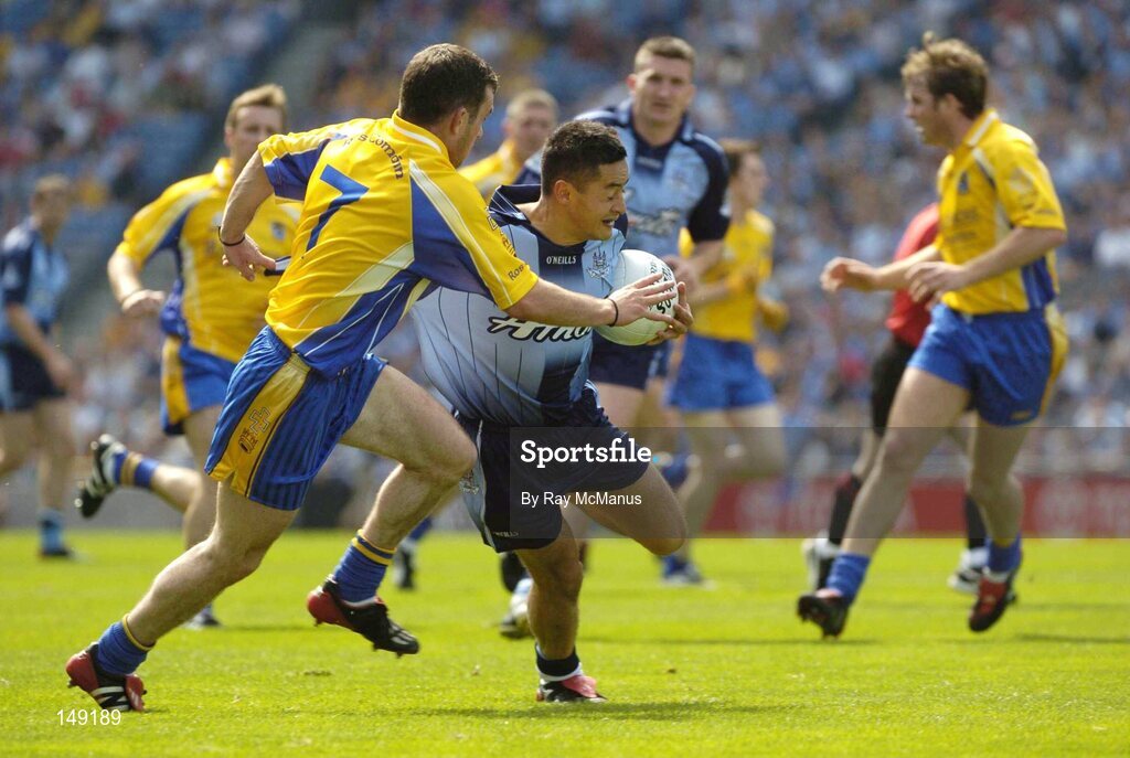 1 August 2004; Jason Sherlock, Dublin, in action against Eamon Towey, Roscommon. Bank of Ireland All-Ireland Football Championship, Round 4, Dublin v Roscommon, Croke Park, Dublin. Picture credit; Ray McManus / SPORTSFILE