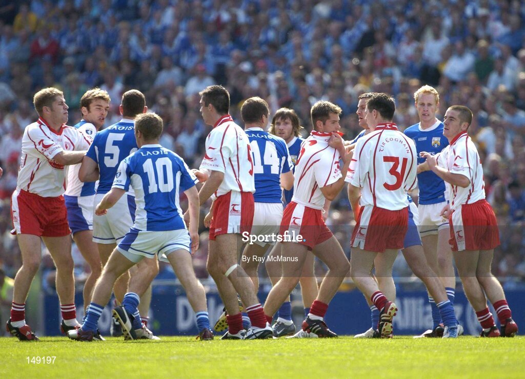 1 August 2004; Players from both sides become involved in a tussle early in the game. Bank of Ireland All-Ireland Football Championship, Round 4, Laois v Tyrone, Croke Park, Dublin. Picture credit; Ray McManus / SPORTSFILE