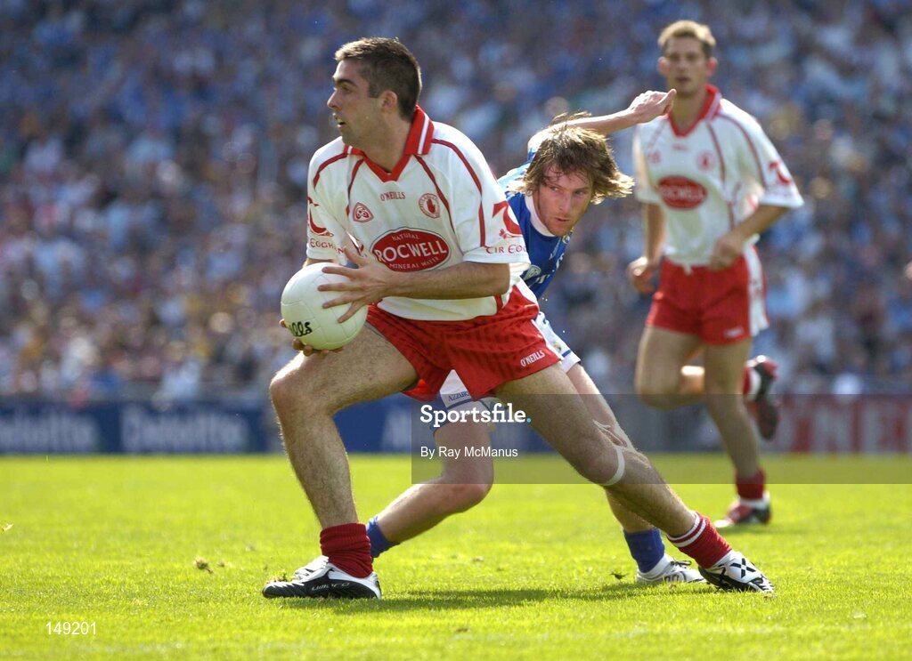 1 August 2004; Joe McMahon, Tyrone, in action against Colm Parkinson, Laois. Bank of Ireland All-Ireland Football Championship, Round 4, Laois v Tyrone, Croke Park, Dublin. Picture credit; Ray McManus / SPORTSFILE