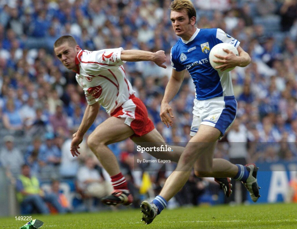 1 August 2004; Noel Garvan, Laois, in action against Philip Jordan, Tyrone. Bank of Ireland All-Ireland Football Championship, Round 4, Laois v Tyrone, Croke Park, Dublin. Picture credit; Damien Eagers / SPORTSFILE