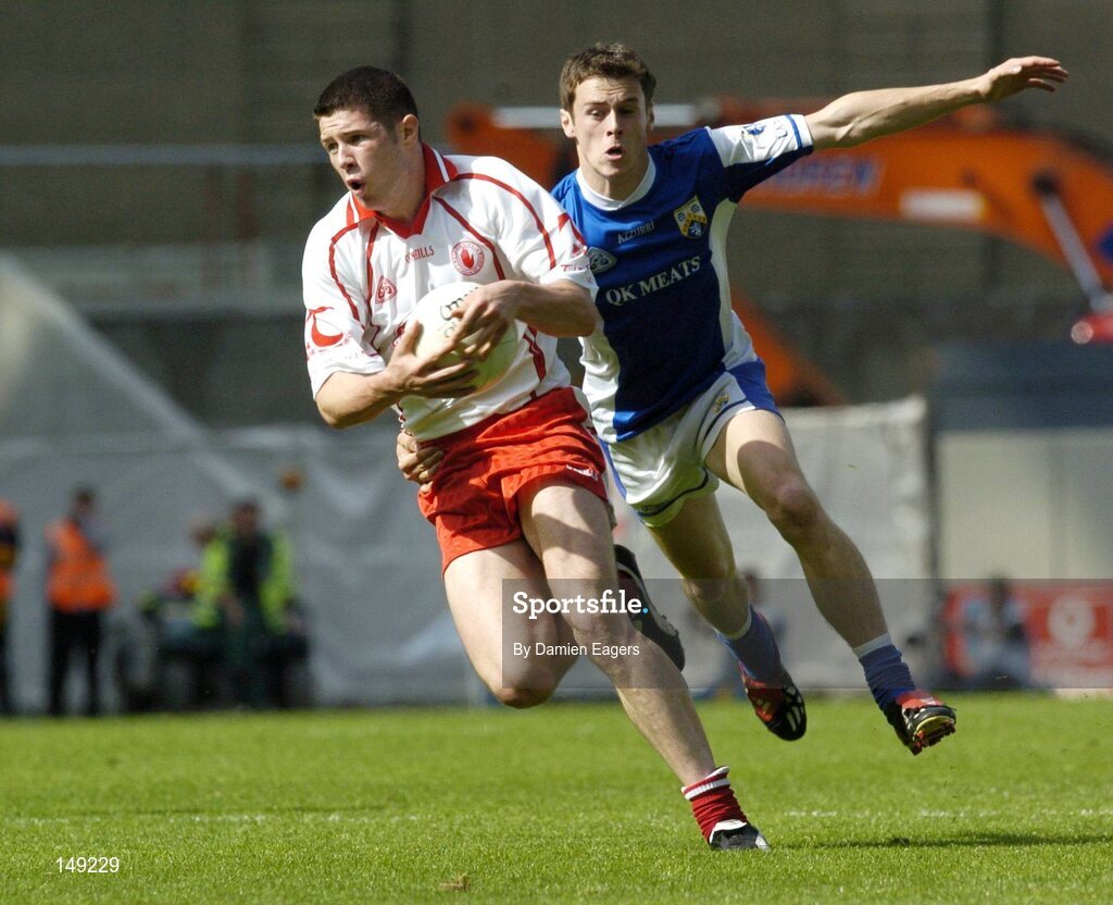 1 August 2004; Sean Cavanagh, Tyrone, in action against Padraig McMahon, Laois. Bank of Ireland All-Ireland Football Championship, Round 4, Laois v Tyrone, Croke Park, Dublin. Picture credit; Damien Eagers / SPORTSFILE