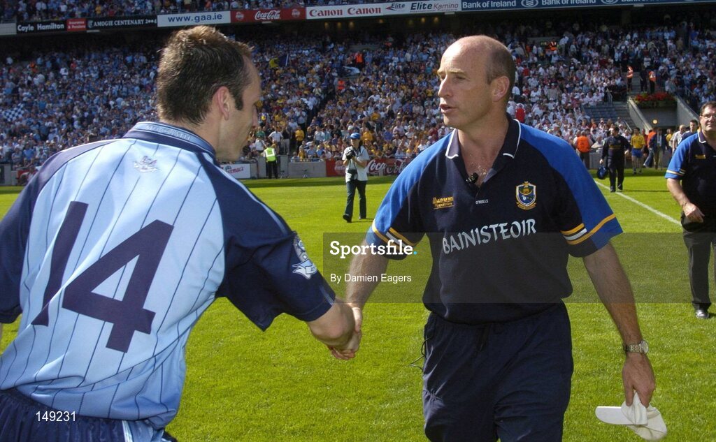 1 August 2004; Roscommon manager Tommy Carr shakes hands with Dublin's Ian Robertson. Bank of Ireland All-Ireland Football Championship, Round 4, Dublin v Roscommon, Croke Park, Dublin. Picture credit; Damien Eagers / SPORTSFILE