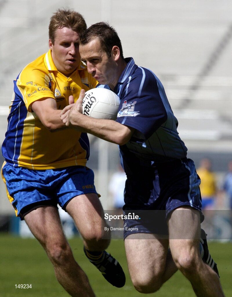 1 August 2004; Ian Robertson, Dublin, in action against Michael Ryan, Roscommon. Bank of Ireland All-Ireland Football Championship, Round 4, Dublin v Roscommon, Croke Park, Dublin. Picture credit; Damien Eagers / SPORTSFILE