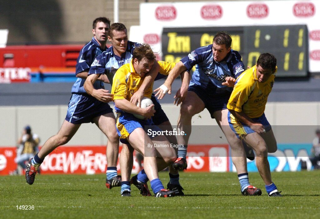 1 August 2004; Roscommon players David Casey and Francie Grehan, right, in action against Dublin players, from left to right, Bryan Cullen, Ciaran Whelan and Jonathan Magee. Bank of Ireland All-Ireland Football Championship, Round 4, Dublin v Roscommon, Croke Park, Dublin. Picture credit; Damien Eagers / SPORTSFILE