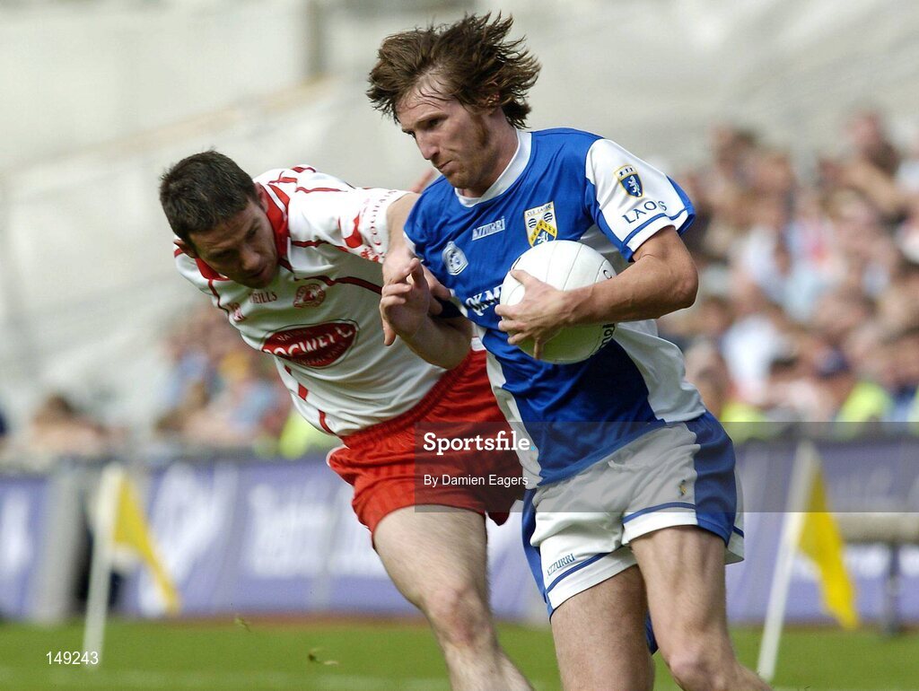 1 August 2004; Colm Parkinson, Laois, in action against Ciaran Gourley, Tyrone. Bank of Ireland All-Ireland Football Championship, Round 4, Laois v Tyrone, Croke Park, Dublin. Picture credit; Damien Eagers / SPORTSFILE