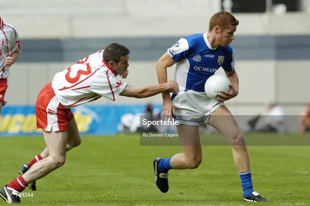 1 August 2004; Donal Miller, Laois, in action against Ciaran Gourley, Tyrone. Bank of Ireland All-Ireland Football Championship, Round 4, Laois v Tyrone, Croke Park, Dublin. Picture credit; Damien Eagers / SPORTSFILE