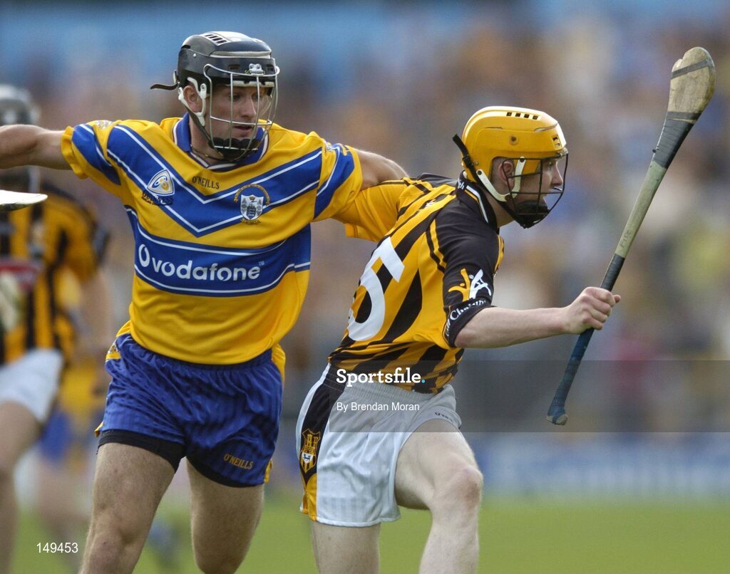 31 July 2004; James ' Cha ' Fitzpatrick, Kilkenny, in action against Alan Markham, Clare. Guinness All-Ireland Hurling Championship Quarter Final Replay, Clare v Kilkenny, Semple Stadium, Thurles, Co. Tipperary. Picture credit; Brendan Moran / SPORTSFILE