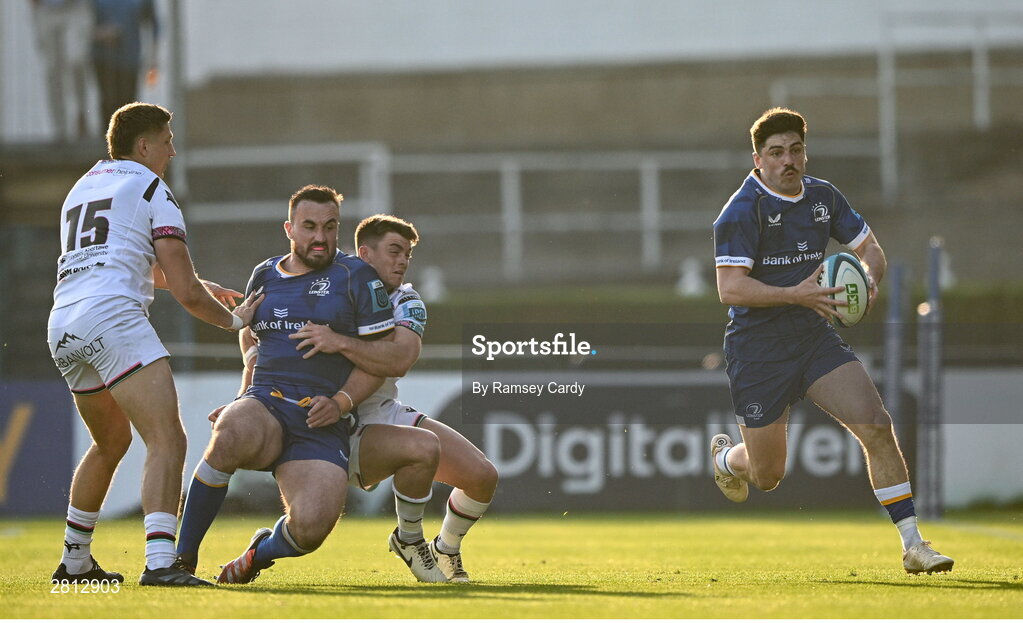 11 May 2024; Jimmy O'Brien of Leinster on his way to scoring his side's first try after a pass by Rónan Kelleher, left,  during the United Rugby Championship match between Leinster and Ospreys at the RDS Arena in Dublin. Photo by Ramsey Cardy/Sportsfile