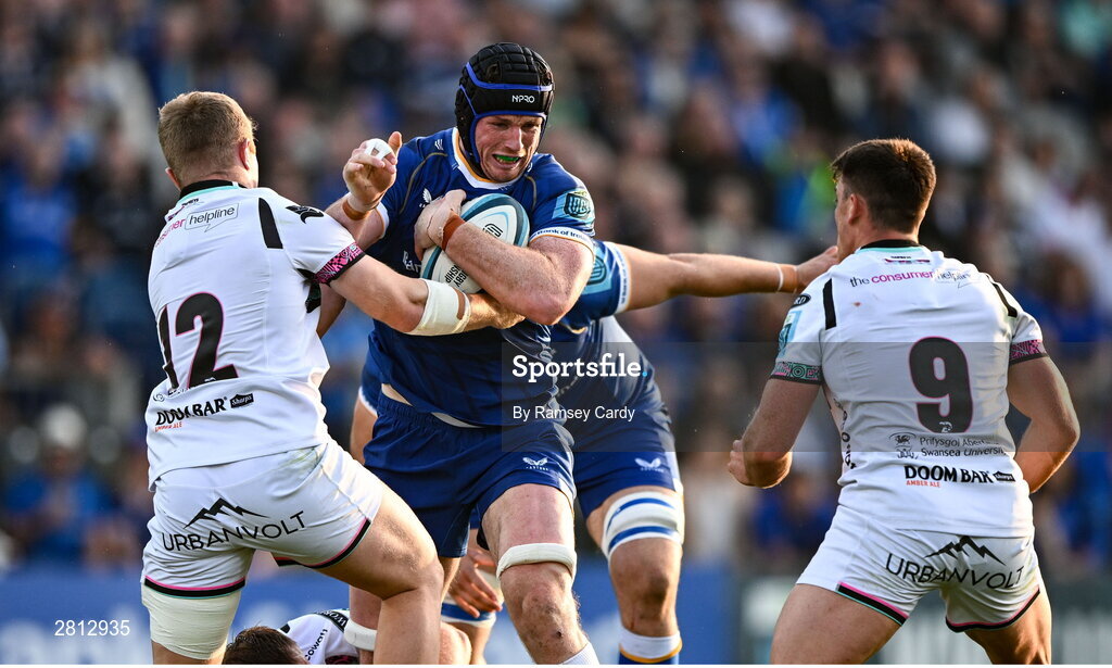 11 May 2024; Ryan Baird of Leinster is tackled by Kieran Williams, left, and Reuben Morgan-Williams of Ospreys during the United Rugby Championship match between Leinster and Ospreys at the RDS Arena in Dublin. Photo by Ramsey Cardy/Sportsfile