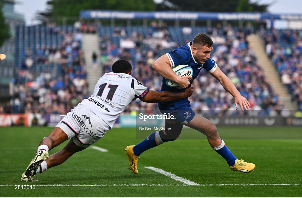 11 May 2024; Jordan Larmour of Leinster evades the tackle of Keelan Giles of Ospreys on his way to scoring his side's fifth try during the United Rugby Championship match between Leinster and Ospreys at the RDS Arena in Dublin. Photo by Ben McShane/Sportsfile