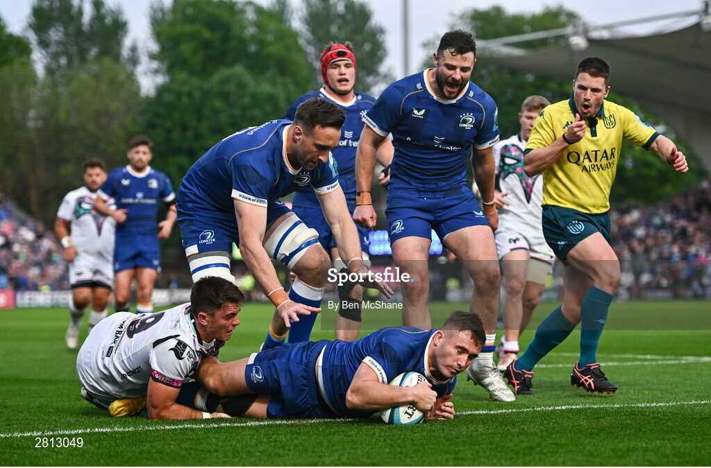 11 May 2024; Jordan Larmour of Leinster dives over to score his side's fifth try despite the tackle of Reuben Morgan-Williams of Ospreys during the United Rugby Championship match between Leinster and Ospreys at the RDS Arena in Dublin. Photo by Ben McShane/Sportsfile