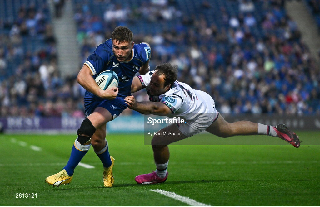 11 May 2024; Jordan Larmour of Leinster is tackled by Evardi Boshoff of Ospreys during the United Rugby Championship match between Leinster and Ospreys at the RDS Arena in Dublin. Photo by Ben McShane/Sportsfile