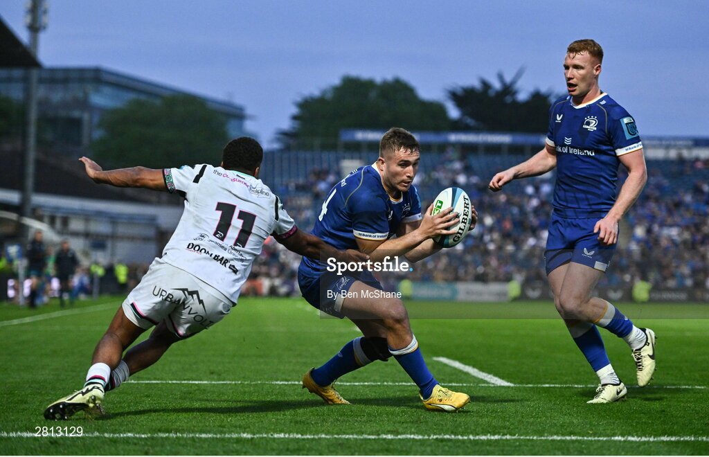 11 May 2024; Jordan Larmour of Leinster gets past the tackle of Keelan Giles of Ospreys on his way to scoring his side's eighth try during the United Rugby Championship match between Leinster and Ospreys at the RDS Arena in Dublin. Photo by Ben McShane/Sportsfile