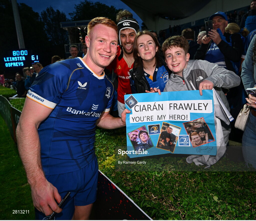 11 May 2024; Ciarán Frawley of Leinster with supporters after the United Rugby Championship match between Leinster and Ospreys at the RDS Arena in Dublin. Photo by Ramsey Cardy/Sportsfile