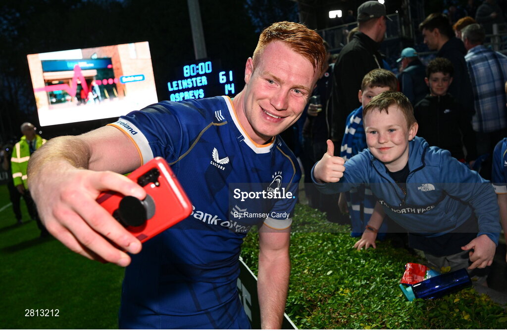 11 May 2024; Ciarán Frawley of Leinster with supporters after the United Rugby Championship match between Leinster and Ospreys at the RDS Arena in Dublin. Photo by Ramsey Cardy/Sportsfile