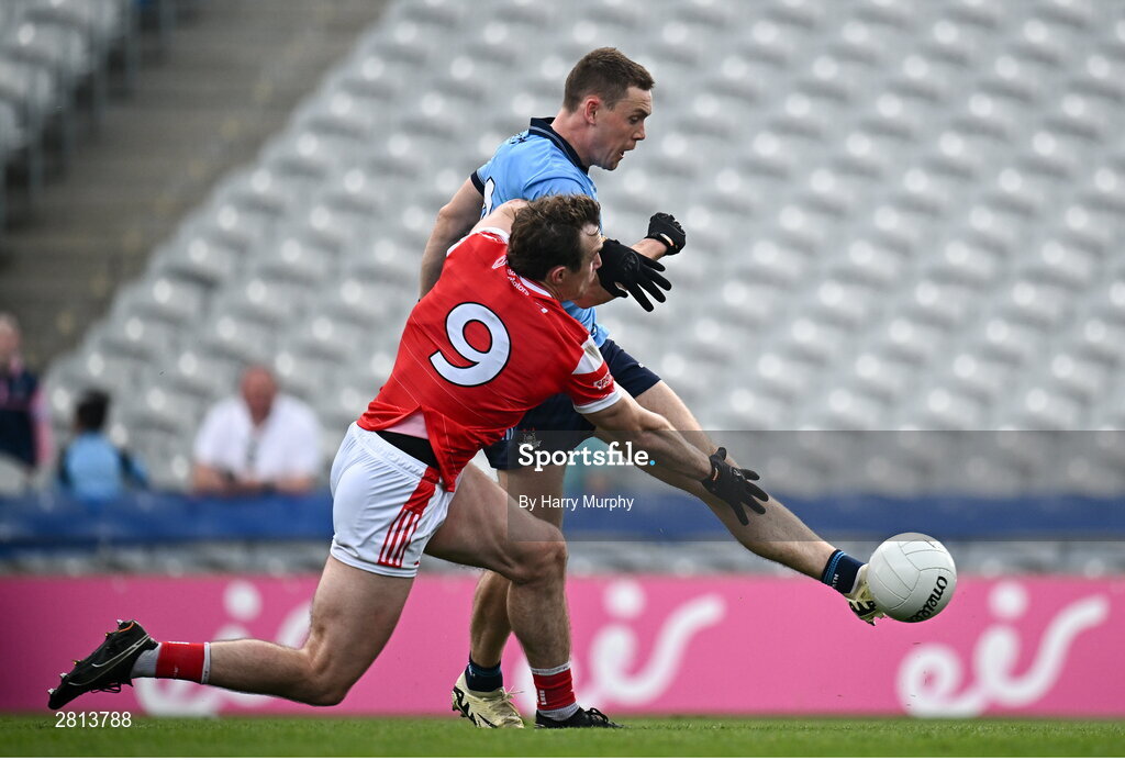 12 May 2024; Con O'Callaghan  of Dublin shoots to score his side's first goal despite the attention of Bevan Duffy of Louth during the Leinster GAA Football Senior Championship final match between Dublin and Louth at Croke Park in Dublin. Photo by Harry Murphy/Sportsfile