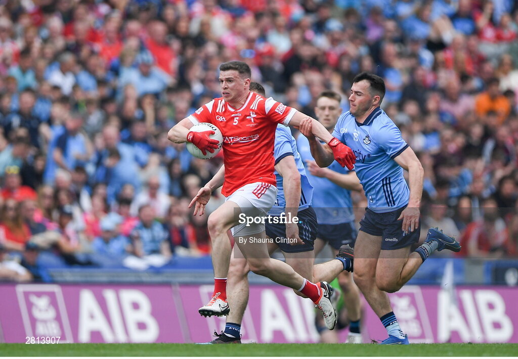 12 May 2024; Conall Mc Keever of Louth is tackled by Colm Basquel of Dublin during the Leinster GAA Football Senior Championship final match between Dublin and Louth at Croke Park in Dublin. Photo by Shauna Clinton/Sportsfile