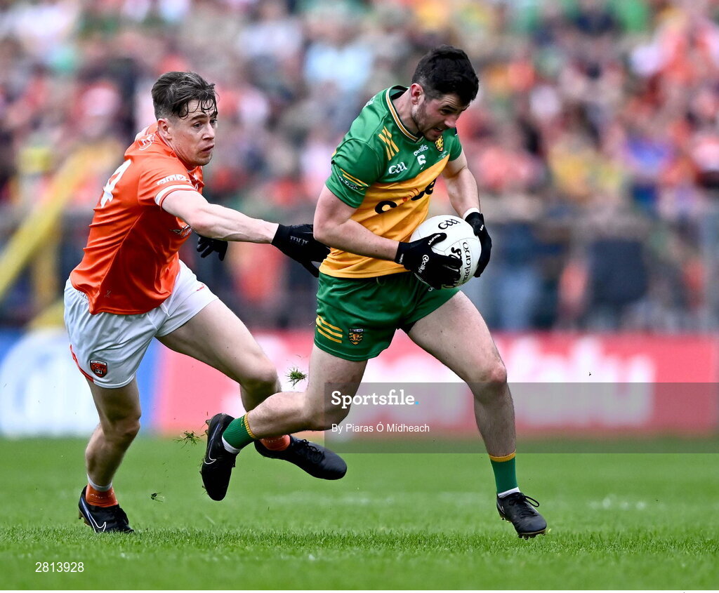 12 May 2024; Ryan McHugh of Donegal in action against Andrew Murnin of Armagh during the Ulster GAA Football Senior Championship final match between Armagh and Donegal at St Tiernach's Park in Clones, Monaghan. Photo by Piaras Ó Mídheach/Sportsfile