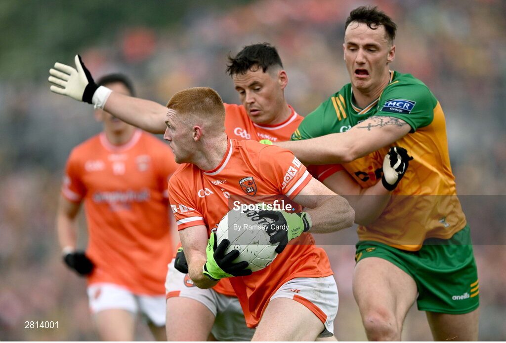 12 May 2024; Ciaran Mackin of Armagh in action against Jason McGee of Donegal during the Ulster GAA Football Senior Championship final match between Armagh and Donegal at St Tiernach's Park in Clones, Monaghan. Photo by Ramsey Cardy/Sportsfile