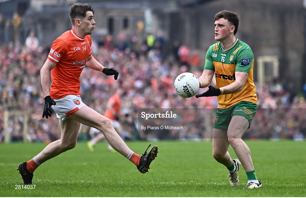 12 May 2024; Niall O'Donnell of Donegal in action against Andrew Murnin of Armagh during the Ulster GAA Football Senior Championship final match between Armagh and Donegal at St Tiernach's Park in Clones, Monaghan. Photo by Piaras Ó Mídheach/Sportsfile