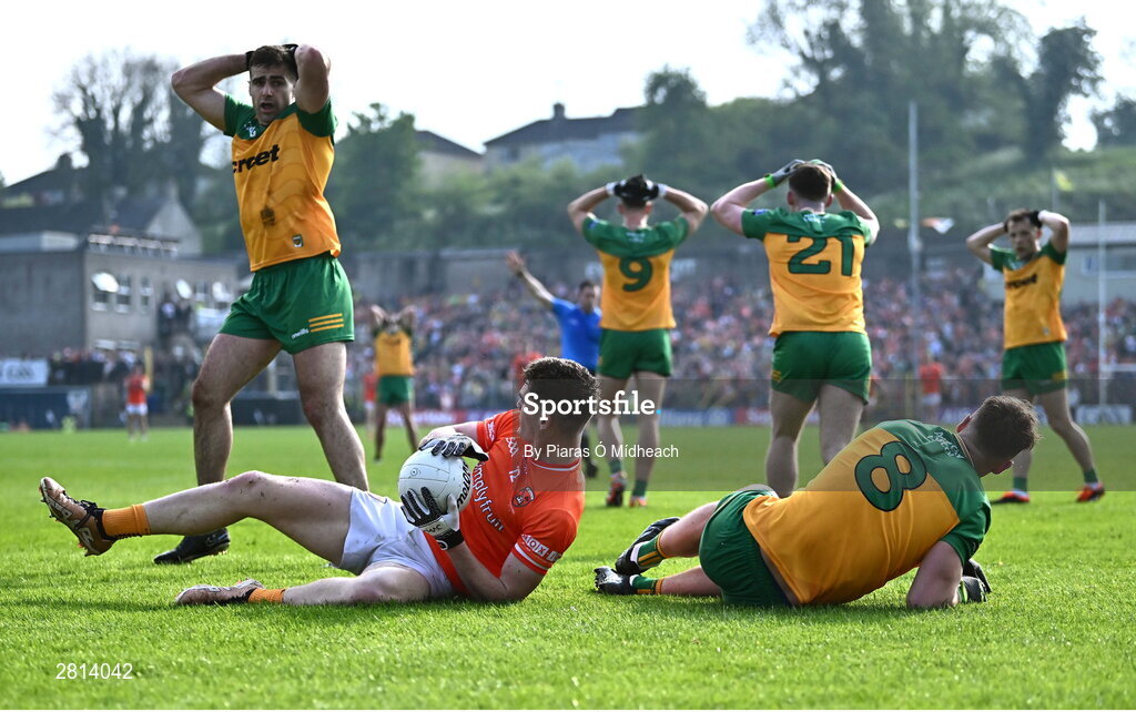 12 May 2024; Donegal players react after referee Martin McNally awarded a free to Jarly Óg Burns of Armagh, left, during the Ulster GAA Football Senior Championship final match between Armagh and Donegal at St Tiernach's Park in Clones, Monaghan. Photo by Piaras Ó Mídheach/Sportsfile