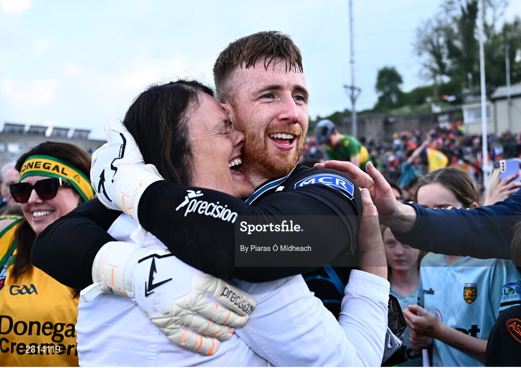 12 May 2024; Donegal goalkeeper Shaun Patton celebrates with supporter Geraldine Gallagher, after saving the final penalty, from Shane McPartlan of Armagh, in the penalty shoot-out of the Ulster GAA Football Senior Championship final match between Armagh and Donegal at St Tiernach's Park in Clones, Monaghan. Photo by Piaras Ó Mídheach/Sportsfile