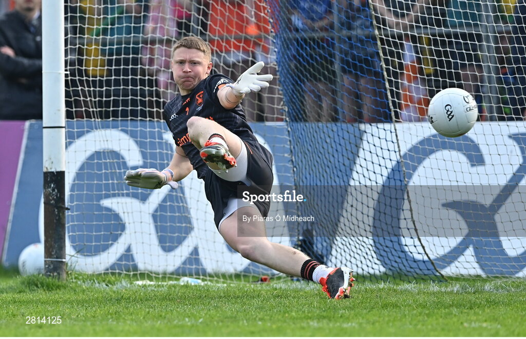 12 May 2024; Armagh goalkeeper Blaine Hughes is beaten for a goal, scored by Ciarán Thompson of Donegal, in the penalty shoot-out of the Ulster GAA Football Senior Championship final match between Armagh and Donegal at St Tiernach's Park in Clones, Monaghan. Photo by Piaras Ó Mídheach/Sportsfile